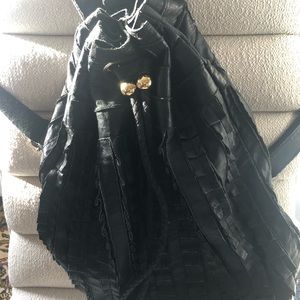 Beautifully detailed backpack by leather artisans
